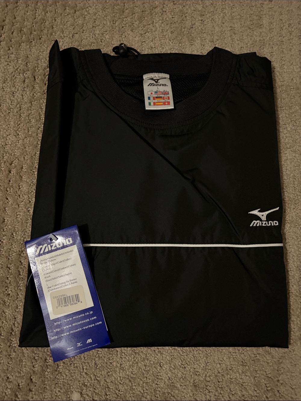 Mizuno Black Short Sleeve Performance Tee with White Chest Stripe